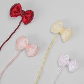 Prendedor de Chupetas - Romance